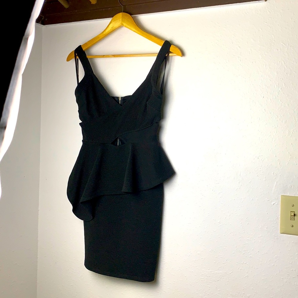 Black cocktail dress with a-symmetrical waistline